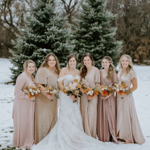 champagne bridesmaids dresses and bouquets